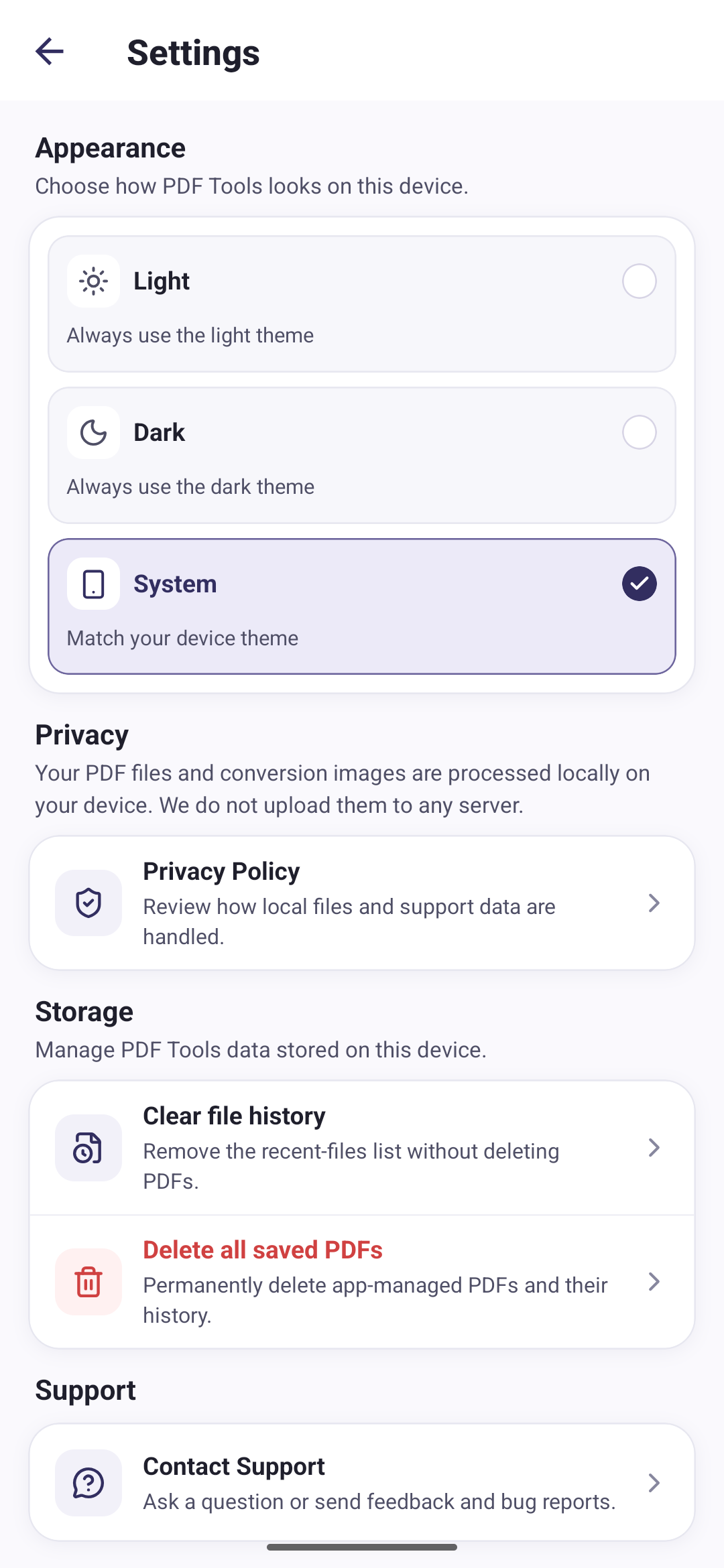 Settings screen with Light, Dark and System appearance options, a privacy policy link, and storage controls for clearing file history or deleting saved PDFs
